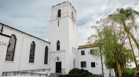 Stately Mission style chapel with white walls and spanish style tile at Fillmore Chapel by Wedgewood Events